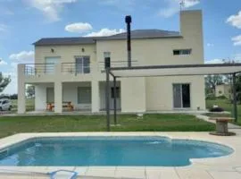 casa completa con piscina en barrio privado en dolares