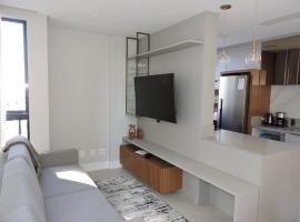 Apart moderno 3 suites 2 vagas de garagem e quadra do mar，位于伊塔佩马的海滩短租房