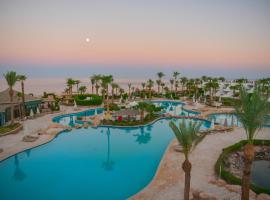 Safir Sharm Waterfalls Resort，位于沙姆沙伊赫阿尔夫莱拉华莱拉购物区附近的酒店