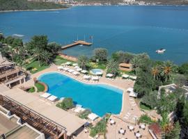 DoubleTree by Hilton Bodrum Isil Club All-Inclusive Resort，位于托尔巴的Spa酒店