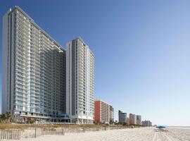 Hilton Grand Vacations Club Ocean Enclave Myrtle Beach，位于默特尔比奇Coastal Federal Field附近的酒店