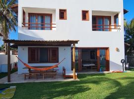 Villa Continentes Brasil & Maison de rêve sur la plage，位于瓜吉鲁的酒店