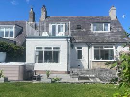 Ivy Cottage Seahouses Seaside Hot Tub Retreat，位于锡豪西斯的度假屋