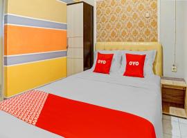 OYO 90793 Btc Guest House Syariah，位于玛琅阿卜杜勒拉赫曼萨利赫机场 - MLG附近的酒店