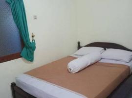 Hotel prima0852 empat 9 tiga 8 nol 3 empat 1 booking chat wa，位于贝努阿亚尔的酒店