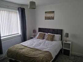 5 bedroom house - Cheshire Oaks，位于埃尔斯米尔港的酒店