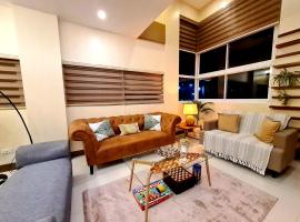 Serenity Home near Ayala Malls Serin，位于大雅台的酒店