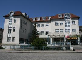 中庭酒店，位于克里米乔莱比锡阿尔滕堡机场 - AOC附近的酒店