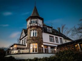 登策海德高尔夫酒店，位于巴特埃姆斯的酒店