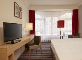 施塔德赫尔佐格维杜金德H+酒店，位于施塔德的酒店