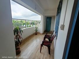 Entire 1BHK & 2BHK private apartments at TAJ RESIDENCY Holiday Homestay - call 767OOO54OO，位于焦尔哈德的酒店