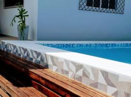 Casa aconchegante com piscina，位于马卡帕的乡村别墅