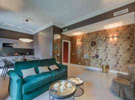 Seven Suites Apartments - Via Matteotti 178，位于圣雷莫的公寓式酒店