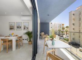 Terracos de Quarteira II Purple by Real Properties，位于奎特里拉的海滩短租房
