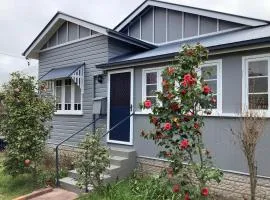 Rosellas on Corundum Cottage - treat yourself!