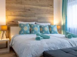 Gelbe Koffer - Design-Apartment in Schiffweiler - Self-Check-in - 2 Parkplätze - WLAN - Balkon mit Gartenzugang - private Terrasse - ruhig gelegen - Nähe See & Wald - bis 4 Pers