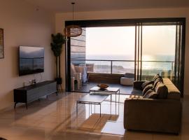 דירת 5 חדרים בבניין הכי טוב בעיר עם נוף מרהיב לים，位于阿什杜德的酒店