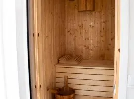 Your own 30sqm house with kitchen, sauna and loft.