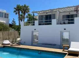 Minimal Blue Apartment with Sunset View in Paros