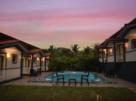 FabEscape Vagator Retreat Resort With Swimming Pool - Nr Vagator Beach，位于戈阿韦尔哈的酒店