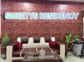 Sweety's Residency，位于布莱尔港的酒店
