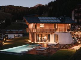 Luxury Spa Chalet Lum d'Or，位于塞尔瓦迪加尔代纳山谷的酒店