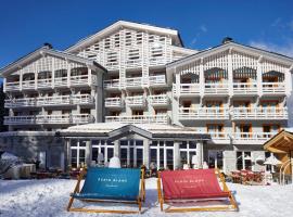 Ecrin Blanc Resort Courchevel，位于谷雪维尔阿荣达斯滑雪缆车附近的酒店
