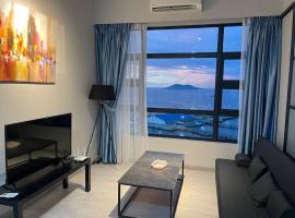 LW Suite at JQ Seaview 2BR High Floor & Wi-Fi，位于哥打京那巴鲁的海滩短租房