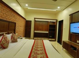 Mid Town Inn Mount Abu，位于卜山的酒店