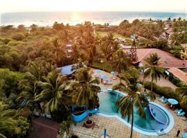 Paradise Village Beach Resort，位于卡兰古特的酒店
