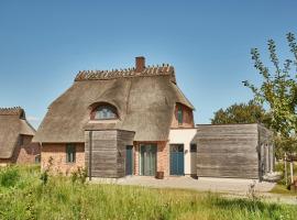 Reetdorf Geltinger Birk Atelierhaus Salzwiese，位于Nieby的酒店