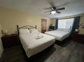 JI7, A Queen Guest Room at the Joplin Inn at entrance to the resort Hotel Room