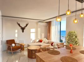 Deniz manzaralı, özel tasarımlı ev .，位于梅才特里的公寓式酒店