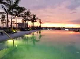 Infinity pool apartment with stunning sunset view - GM Remia Residence Ambang Botanic，位于巴生的带泳池的酒店