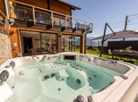 annecyhappylodge 5 * appartement indépendant RDCH chalet 5 pers vue lac jaccuzzi，位于圣若里奥的酒店