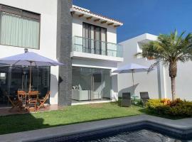 Casa More con alberca, jacuzzi, climatizada，位于特克塞丁戈的酒店