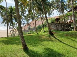 Karikkathi Beach Villa rooms，位于特里凡得琅的度假短租房