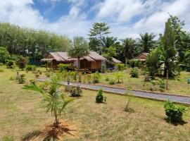 Palm Garden Bungalows，位于高兰的木屋