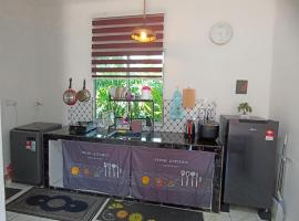Haji Ineng Homestay- Guest House，位于Kota Samarahan的度假短租房