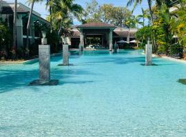 Lagoon Swimout Absolute Pool Front - Slice of Paradise - Sea Temple Pt Douglas，位于道格拉斯港的度假短租房