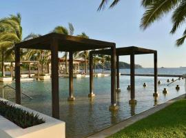 HERMOSO DEPARTAMENTO DE LUJO EN MANZANILLO A PIE DE PLAYA EN PONTO HORIZONTE MANZANILLO. PARA HASTA 8 PERSONAS, DE LO MEJOR DE MANZANILLO. HERMOSA VISTA AL MAR，位于曼萨尼约的酒店