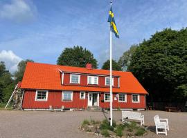 Sjökaptensgården Bed & Breakfast，位于Åsljunga的酒店