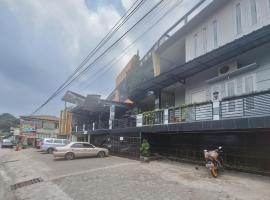 RedDoorz @ Hotel Arwana Safari Puncak，位于Tagalbato的酒店