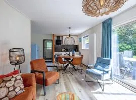 Cozy holiday home in Den Burg with hot tub