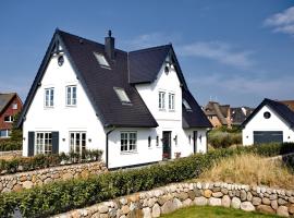 NEU! Ferienhaus Litj Horsa Hoog - Luxus, Lage, Leichtigkeit mit Wellenrauschen in Wenningstedt Sylt，位于文尼斯塔特的酒店