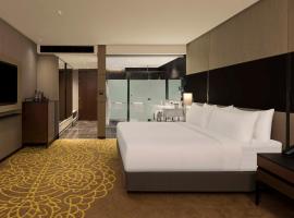 Hilton Bengaluru Embassy Manyata Business Park，位于班加罗尔的酒店