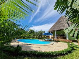 Paradiesische Villa Maisha Mazuri mit Pool. Terrasse und Personal，位于迪亚尼海滩的度假屋