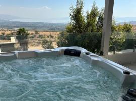 ציפור הכנרת - Sea of Galilee bird，位于哈德内斯的带按摩浴缸的酒店