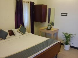 Olive Rooms Kodaikanal with WiFi, Spacious Rooms, Parking, Nearby Homemade Food，位于科代卡纳尔的旅馆