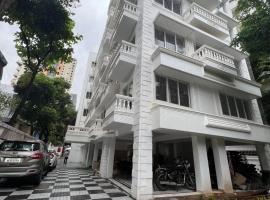 White House by Maxxvalue Service Apartments Bandra，位于孟买班德拉火车站附近的酒店